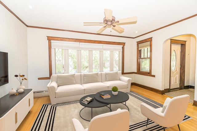 3110 N 78th Ave, Elmwood Park, IL 60707 - living room with light wood finished floors, crown molding, arched walkways, a baseboard heating unit, and a ceiling fan