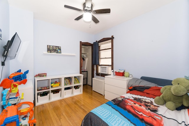 3110 N 78th Ave, Elmwood Park, IL 60707 - bedroom featuring light wood-type flooring, cooling unit, and ceiling fan