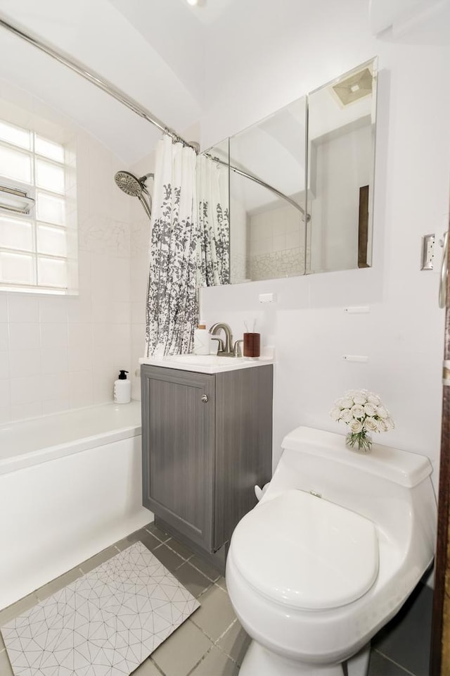 3110 N 78th Ave, Elmwood Park, IL 60707 - bathroom featuring shower / bath combo, vanity, and tile patterned floors