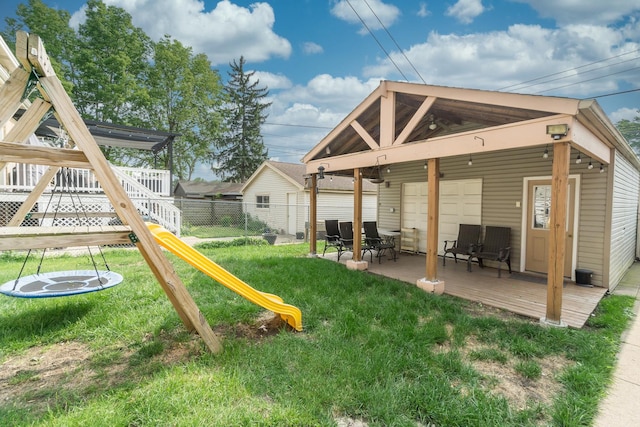 3110 N 78th Ave, Elmwood Park, IL 60707 - view of yard with a playground, a deck, and a patio area