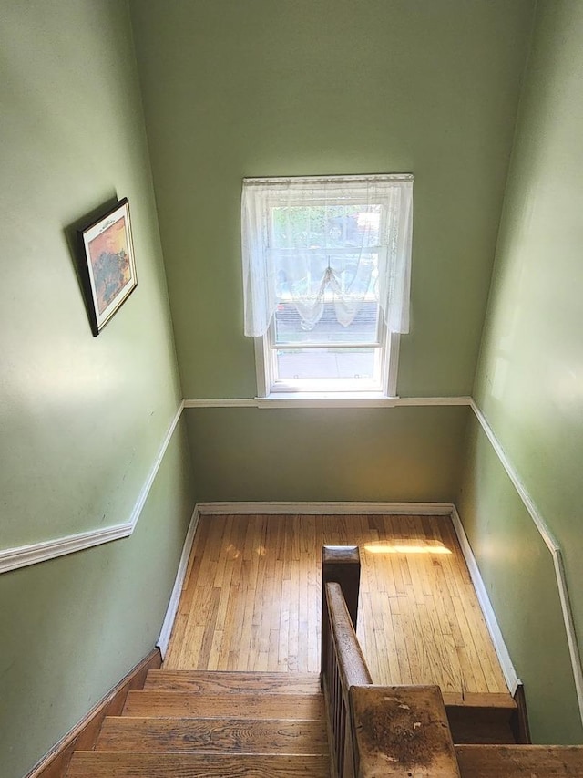 6539 N California Ave Unit 2S, Chicago, IL 60645 - stairs with hardwood / wood-style floors and baseboards