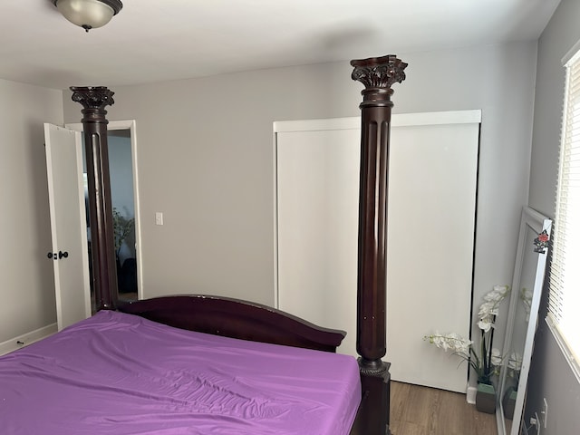 700 Cumberland St, Hoffman Estates, IL 60194 - bedroom with wood finished floors and multiple windows