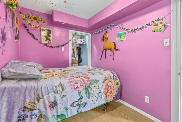 2103 N Long Ave, Chicago, IL 60639 - bedroom with wood finished floors and a closet