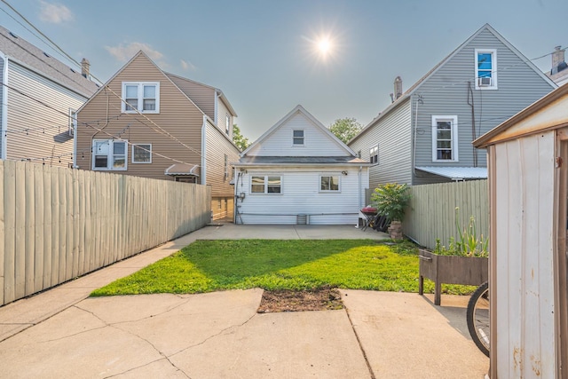 2103 N Long Ave, Chicago, IL 60639 - back of house with a patio and a fenced backyard