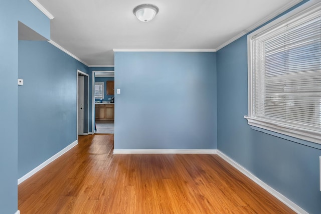2103 N Long Ave, Chicago, IL 60639 - unfurnished room featuring wood finished floors and ornamental molding