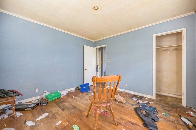 230 W Garfiled Ave, Decatur, IL 62526 - unfurnished bedroom with wood-type flooring and crown molding