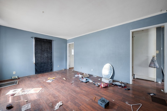 230 W Garfiled Ave, Decatur, IL 62526 - unfurnished bedroom featuring wood finished floors