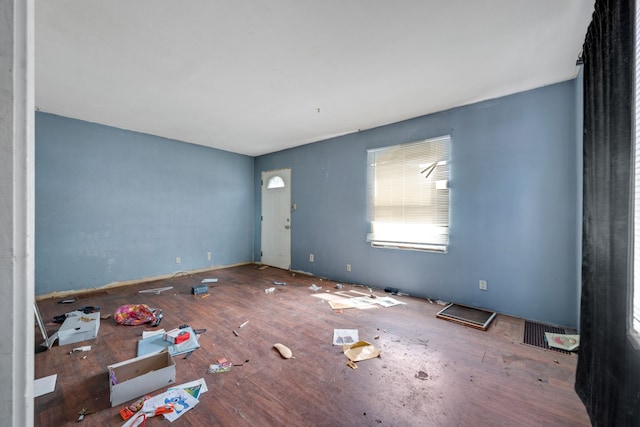230 W Garfiled Ave, Decatur, IL 62526 - unfurnished living room with hardwood / wood-style floors
