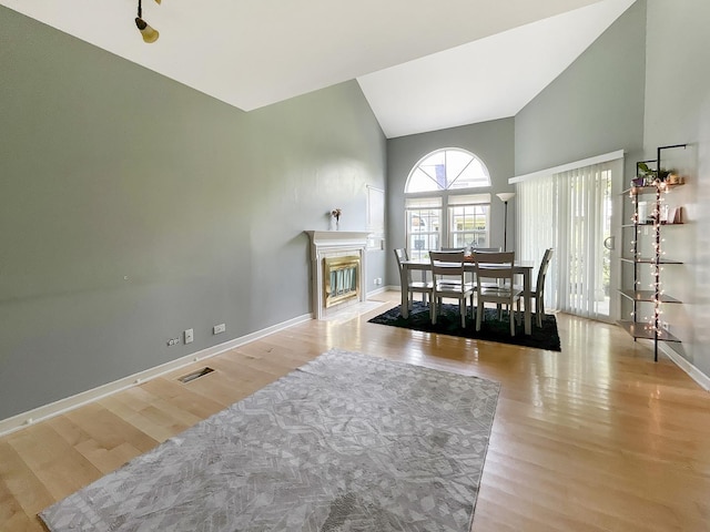 1277 Donegal Ct, Carol Stream, IL 60188 - dining room featuring high vaulted ceiling and wood finished floors