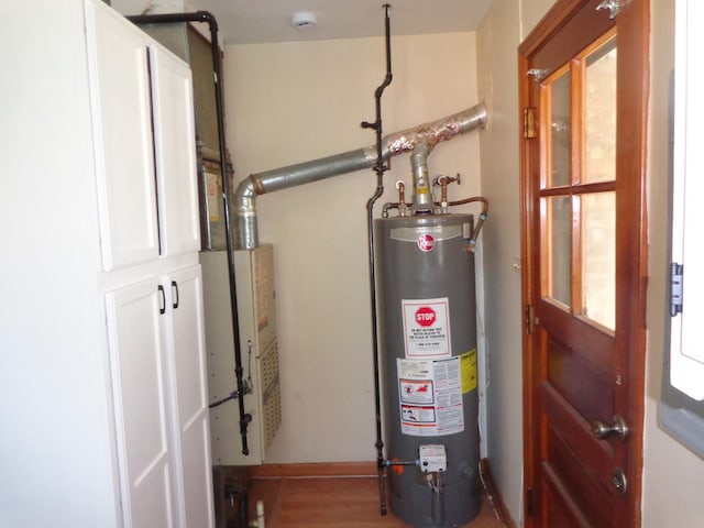 5157 W 90th St, Oak Lawn, IL 60453 - utility room featuring gas water heater