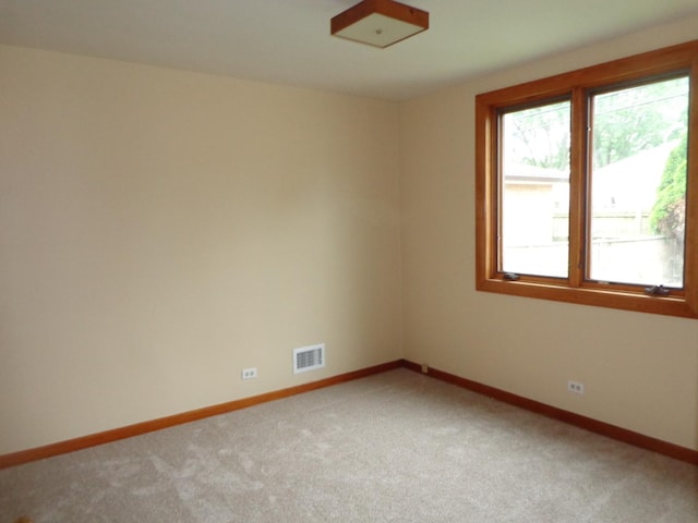 5157 W 90th St, Oak Lawn, IL 60453 - empty room featuring light colored carpet and baseboards