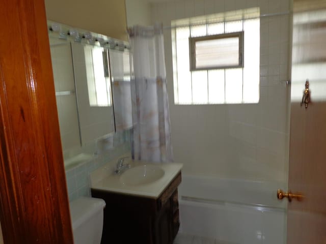 5157 W 90th St, Oak Lawn, IL 60453 - bathroom featuring vanity and bathtub / shower combination