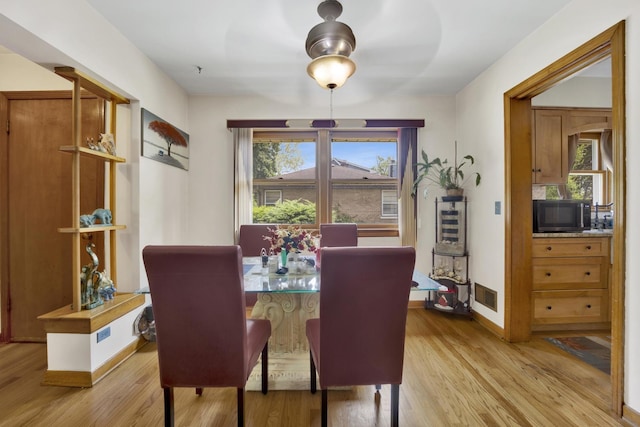 648 S Illinois Ave, Villa Park, IL 60181 - dining room with light wood finished floors