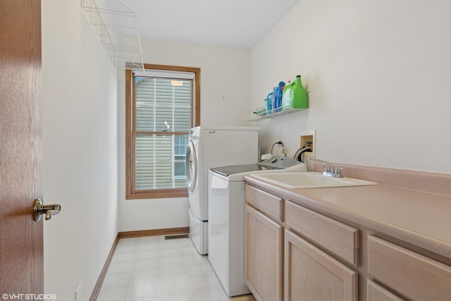 1456 Della Dr, Hoffman Estates, IL 60169 - laundry room featuring light floors, washer and dryer, baseboards, and cabinet space