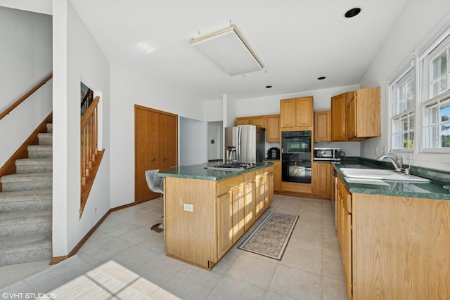 1456 Della Dr, Hoffman Estates, IL 60169 - kitchen with a sink, appliances with stainless steel finishes, a kitchen island, and dark countertops