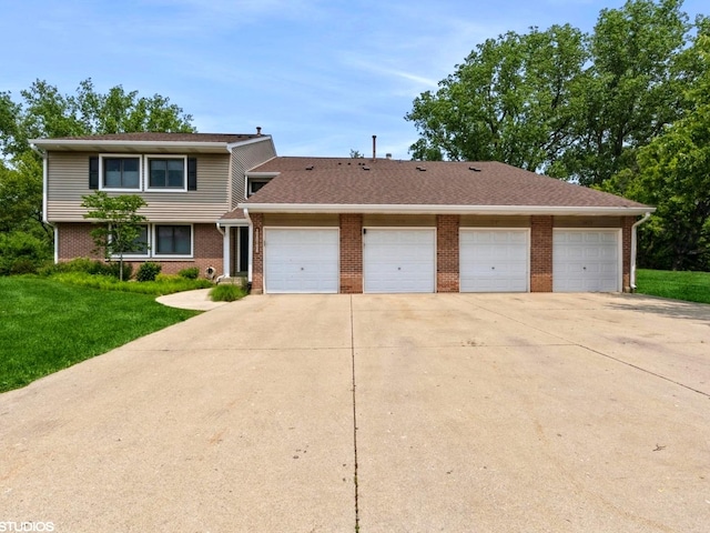1022 Pinetree Cir N Unit 1022, Buffalo Grove, IL 60089 - view of front facade featuring brick siding and a front yard