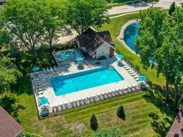 1022 Pinetree Cir N Unit 1022, Buffalo Grove, IL 60089 - aerial view of a pool area