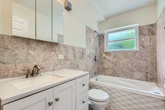 2067 W Farwell Ave Unit 1S, Chicago, IL 60645 - full bathroom featuring tiled shower / bath, vanity, and tile walls