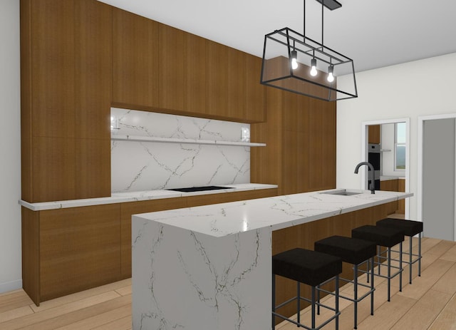 1143 Clinton Ave, Oak Park, IL 60304 - kitchen featuring modern cabinets, brown cabinets, and light wood-style floors