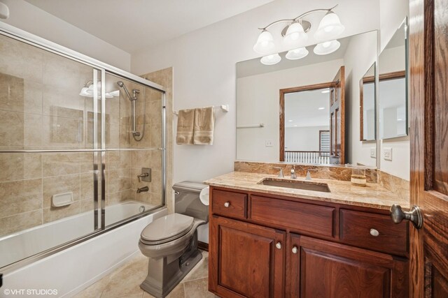1012 Hickory Dr, Western Springs, IL 60558 - bathroom with vanity, shower / bath combination with glass door, and tile patterned floors