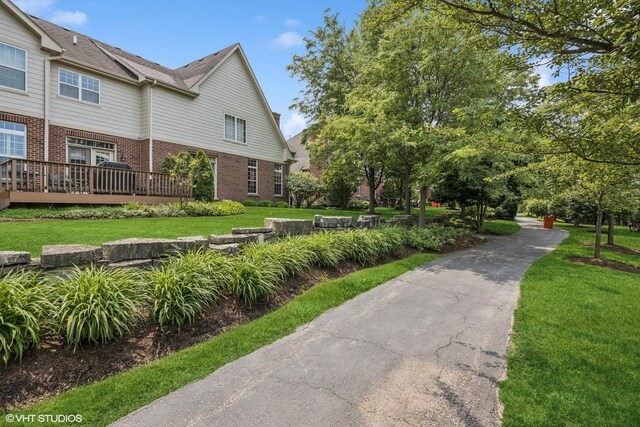 1012 Hickory Dr, Western Springs, IL 60558 - view of property exterior with brick siding and a yard