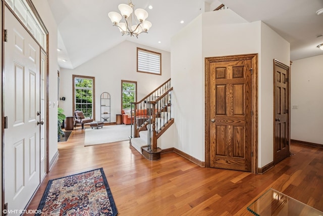 1012 Hickory Dr, Western Springs, IL 60558 - entrance foyer with stairway, wood finished floors, high vaulted ceiling, and a chandelier