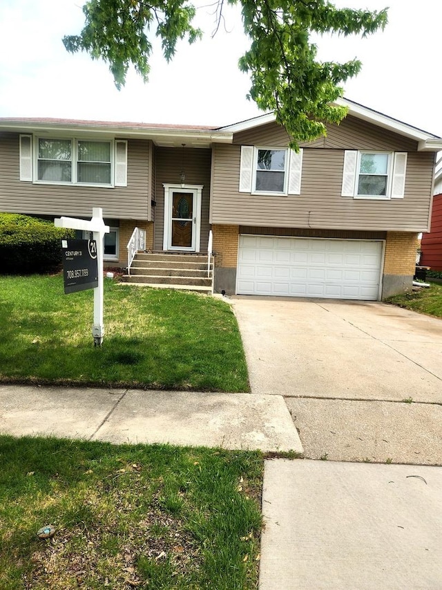 17109 Magnolia Dr, Hazel Crest, IL 60429 - split foyer home with a garage, concrete driveway, and a front yard