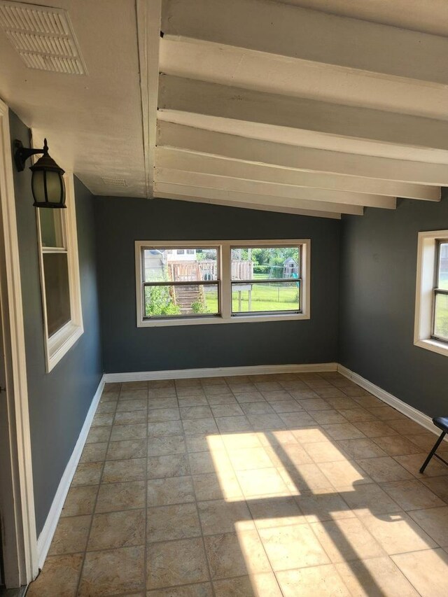 17109 Magnolia Dr, Hazel Crest, IL 60429 - empty room featuring plenty of natural light and lofted ceiling