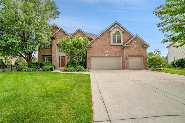 327 White Pines Ct, Oswego, IL 60543 - traditional home featuring brick siding, concrete driveway, and an attached garage