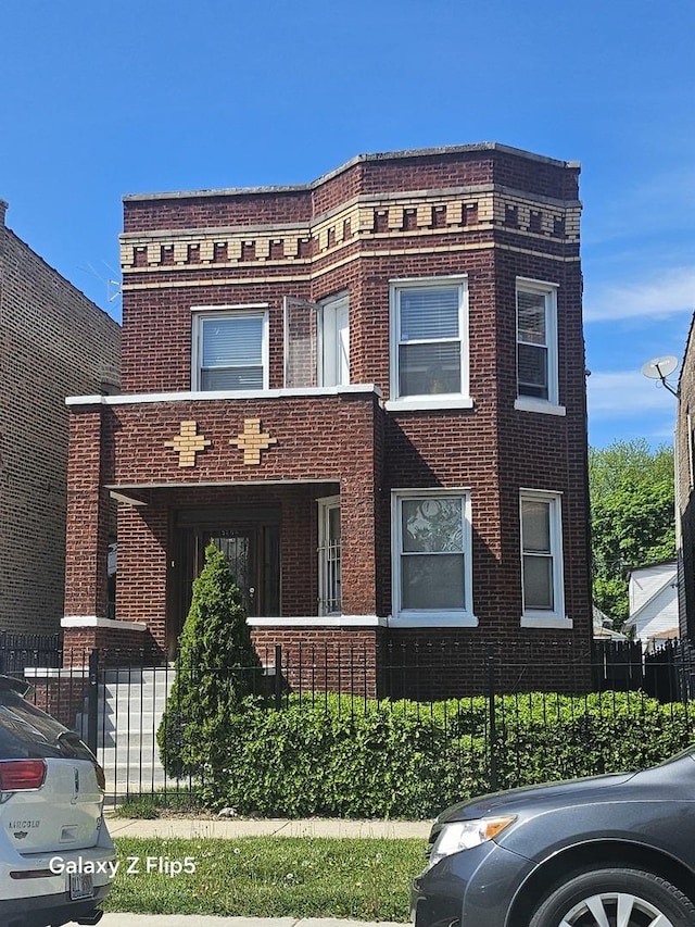 5006 W Crystal St, Chicago, IL 60651 - view of front of home featuring brick siding and a fenced front yard