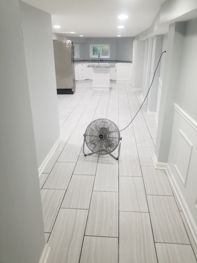 5006 W Crystal St, Chicago, IL 60651 - hall featuring a sink and recessed lighting