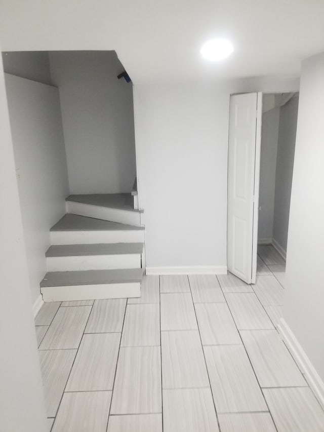 5006 W Crystal St, Chicago, IL 60651 - stairway featuring baseboards