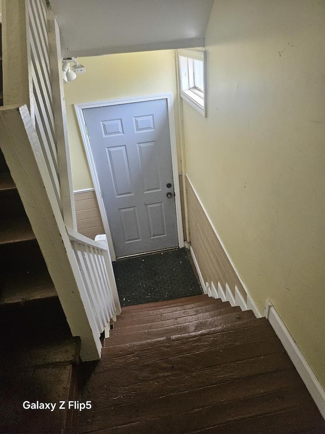 5006 W Crystal St, Chicago, IL 60651 - stairs featuring a wainscoted wall and wood finished floors