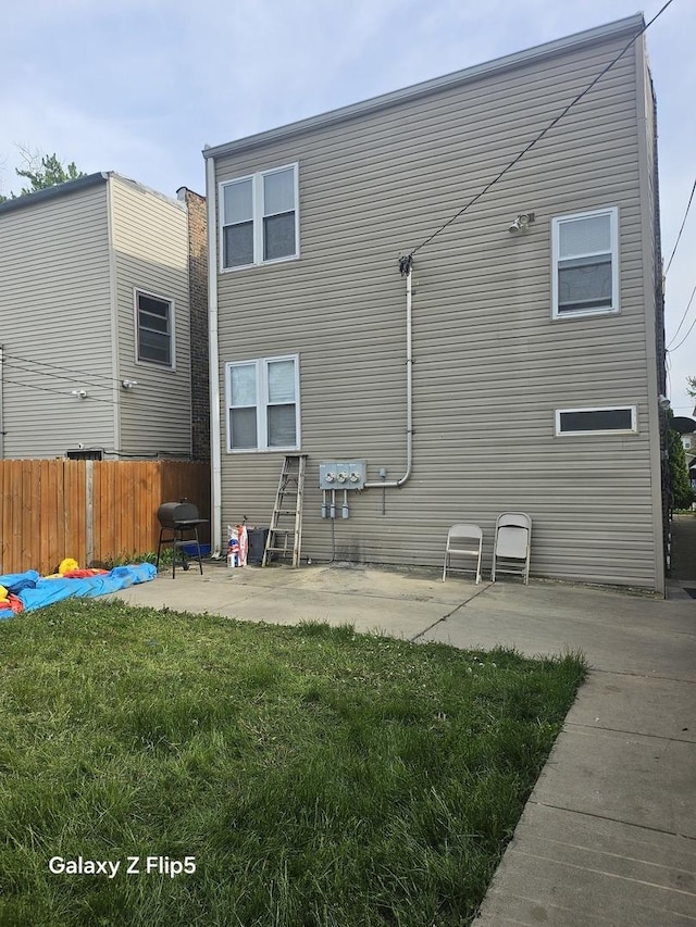 5006 W Crystal St, Chicago, IL 60651 - rear view of property featuring a patio