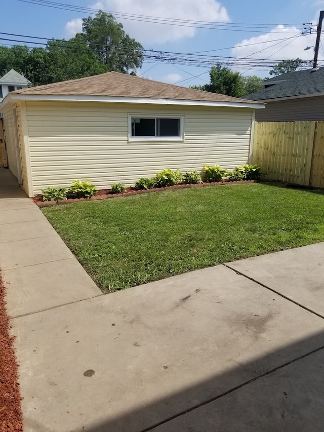 5006 W Crystal St, Chicago, IL 60651 - view of property exterior featuring a shingled roof