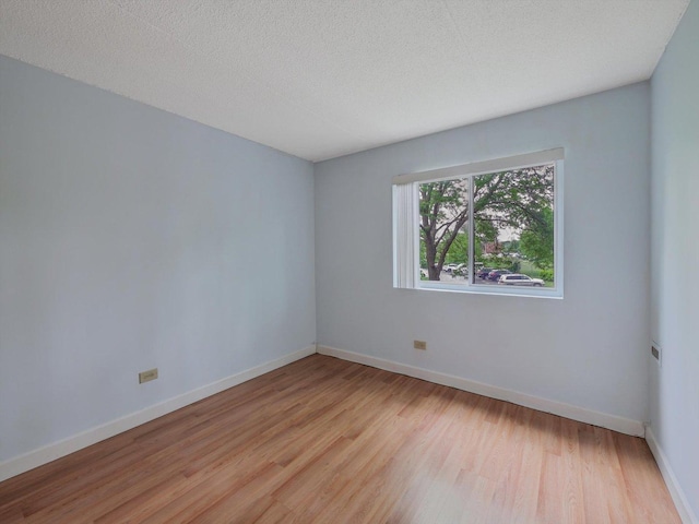 5600 Astor Ln Unit 202, Rolling Meadows, IL 60008 - unfurnished room featuring light wood-type flooring