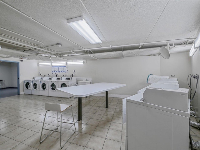 5600 Astor Ln Unit 202, Rolling Meadows, IL 60008 - shared laundry with separate washer and dryer and light tile patterned floors