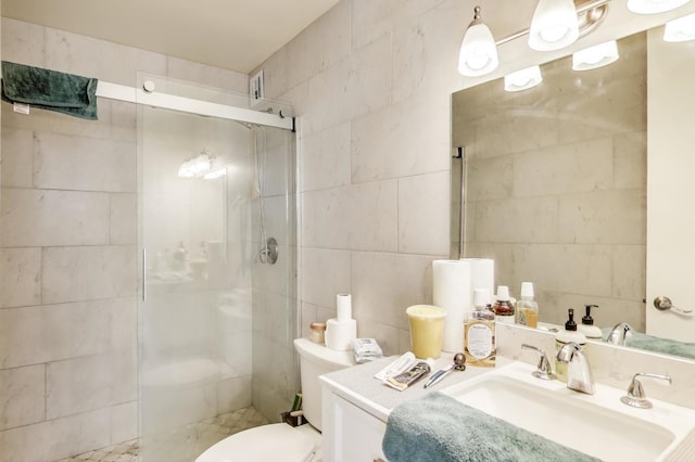 6700 S S Shore Dr Unit 17C, Chicago, IL 60649 - full bathroom with tile walls, a shower stall, and vanity