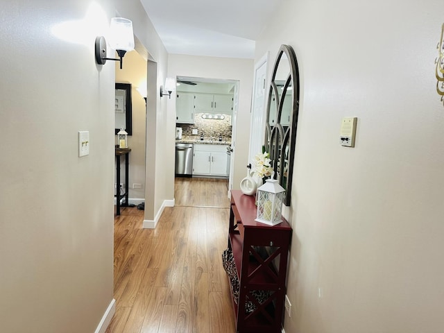 15721 Old Orchard Ct Unit 2S, Orland Park, IL 60462 - hall featuring light wood-style floors and a sink