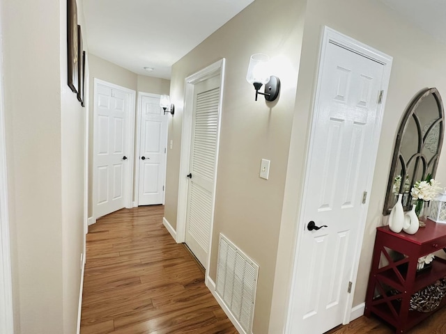 15721 Old Orchard Ct Unit 2S, Orland Park, IL 60462 - corridor with wood finished floors and baseboards