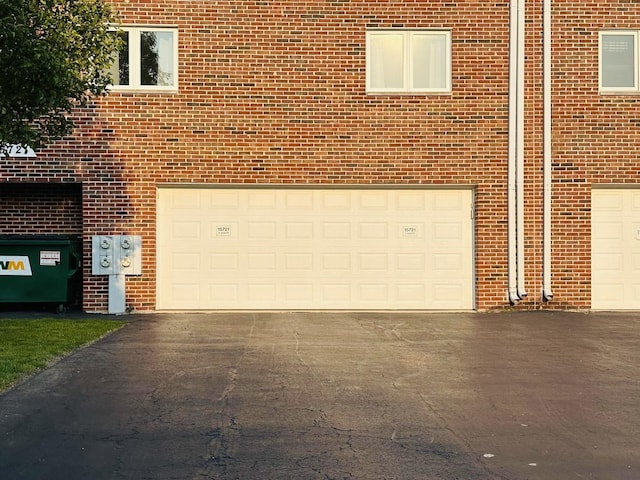 15721 Old Orchard Ct Unit 2S, Orland Park, IL 60462 - garage featuring driveway