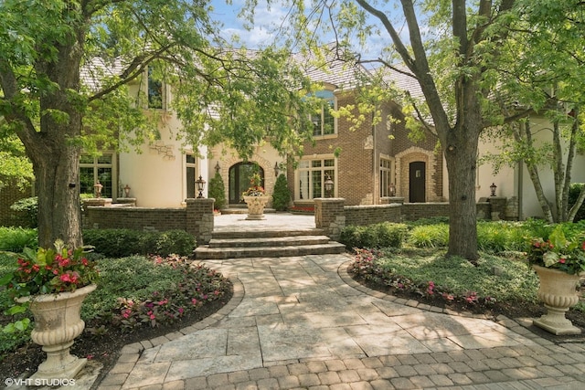 5688 Rosos Pkwy, Long Grove, IL 60047 - tudor house featuring brick siding and stucco siding