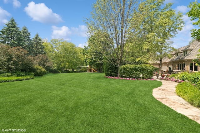 5688 Rosos Pkwy, Long Grove, IL 60047 - view of green lawn with a playground
