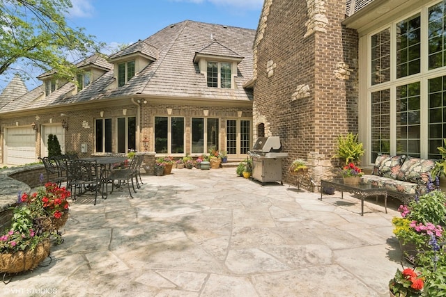 5688 Rosos Pkwy, Long Grove, IL 60047 - rear view of house with brick siding, a patio area, outdoor lounge area, and outdoor dining space