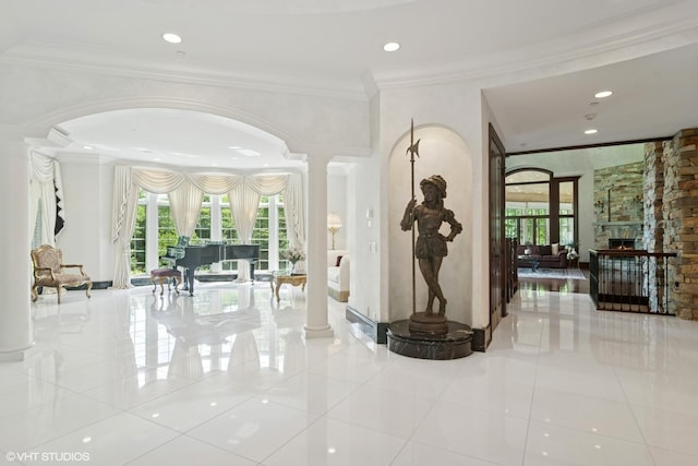 5688 Rosos Pkwy, Long Grove, IL 60047 - hall with decorative columns, arched walkways, ornamental molding, tile patterned floors, and recessed lighting