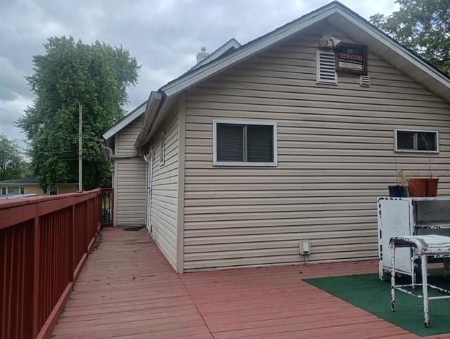 213 Edward St, Joliet, IL 60436 - view of side of home with a wooden deck