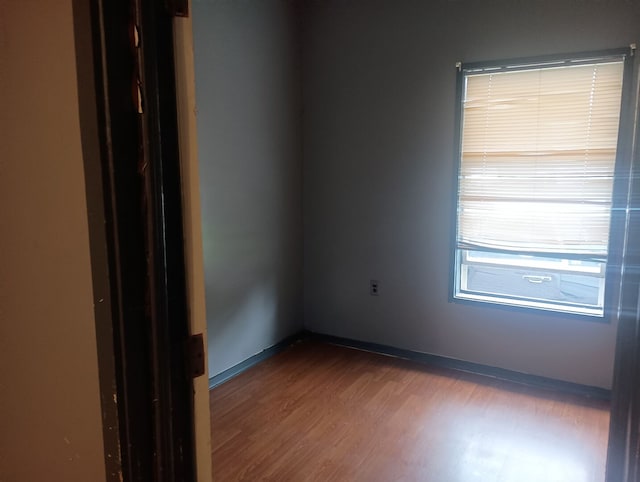 213 Edward St, Joliet, IL 60436 - unfurnished room with wood finished floors