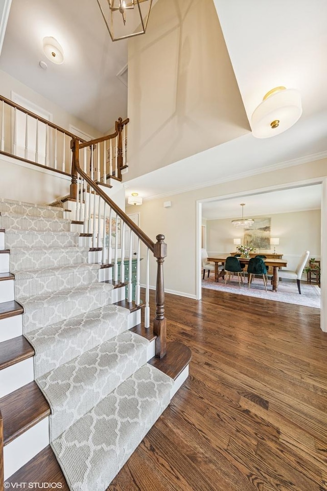 1808 Beloit Ct, Naperville, IL 60565 - stairs featuring a chandelier and wood finished floors
