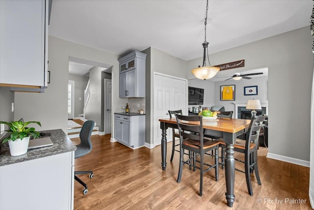 2171 Edinburgh Ln, Aurora, IL 60504 - dining space featuring wood finished floors and a ceiling fan