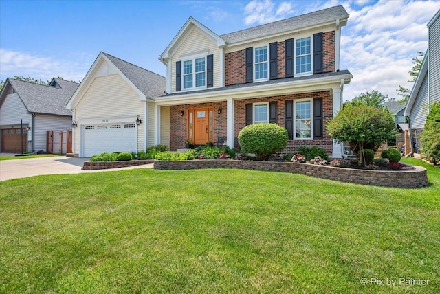 2171 Edinburgh Ln, Aurora, IL 60504 - view of front of home with brick siding, an attached garage, driveway, and a front yard